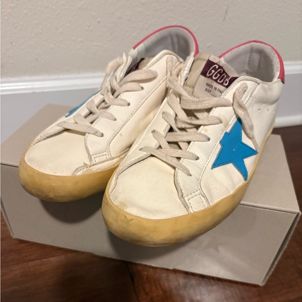 white golden goose Sneakers with Blue Star Accent